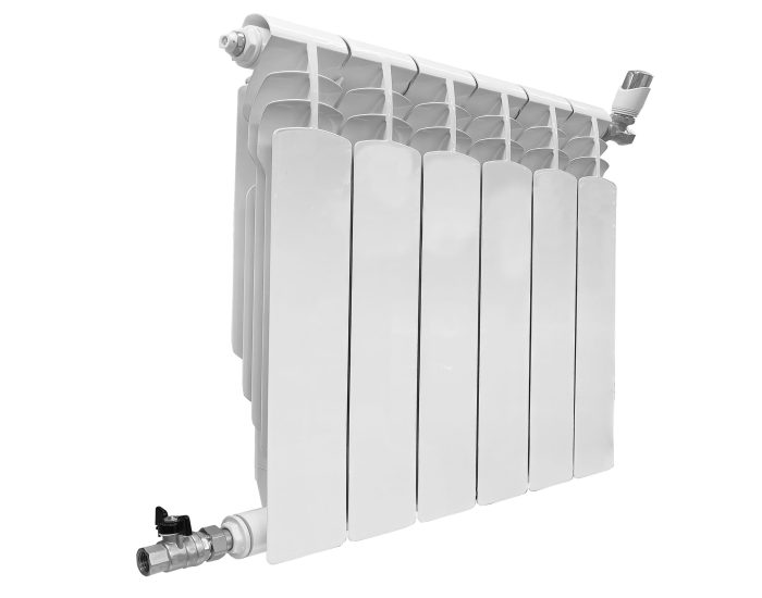 Heater battery isolated on black background. Radiator. Home water heater convector isolated. Heating convector.
